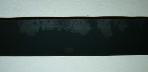 half inch VHS tape with damaged tape layers