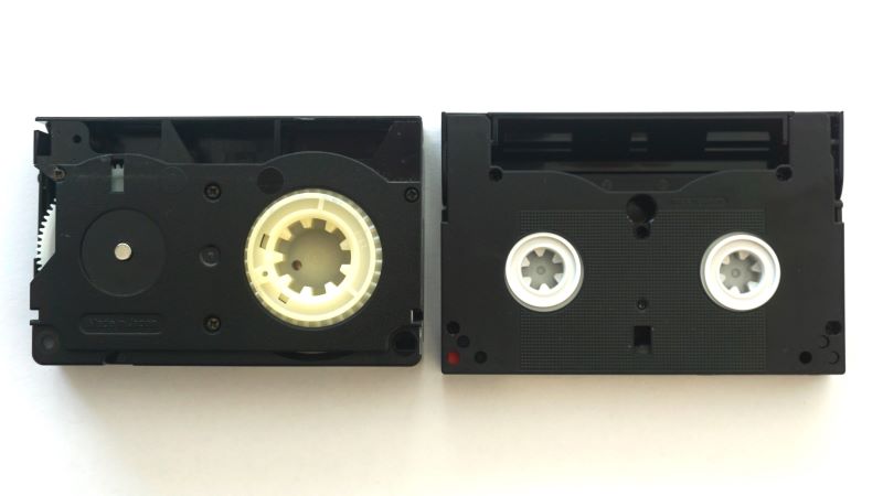 VHS C vs Video 8 cassette underside